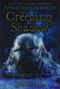 Cover image of The creeping shadow