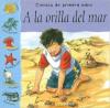 Cover image of A la orilla del mar