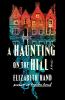 Cover image of A haunting on the hill