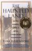 Cover image of The haunted land