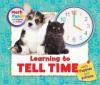 Cover image of Learning to tell time with puppies and kittens