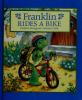 Cover image of Franklin rides a bike